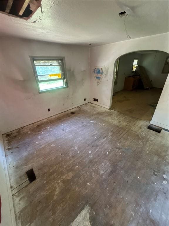 1159 Mueller Ave, Decatur, IL 62526 - interior space featuring arched walkways and hardwood / wood-style flooring