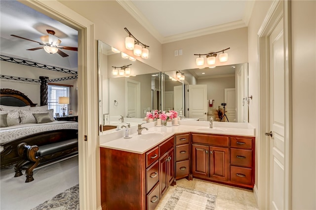 bathroom featuring crown molding, a sink, a ceiling fan, double vanity, and ensuite bathroom