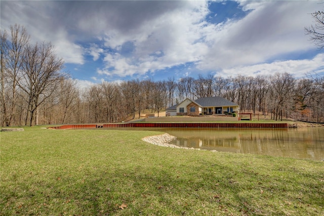 view of yard with a water view