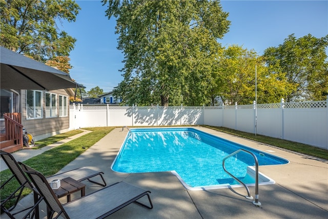 view of pool featuring a patio