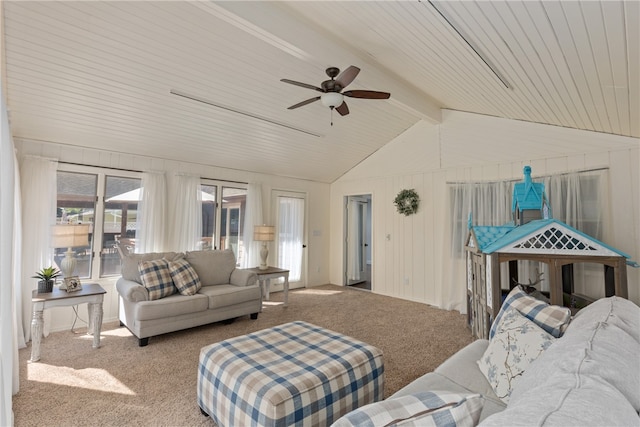 living room featuring carpet flooring, lofted ceiling with beams, and ceiling fan