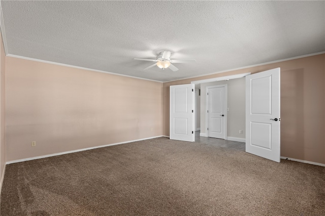 unfurnished bedroom featuring ceiling fan, crown molding, dark carpet, and a textured ceiling