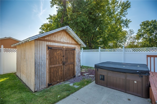 view of outbuilding with a hot tub