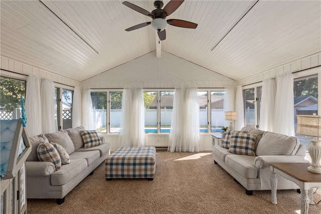 sunroom / solarium featuring ceiling fan, wooden ceiling, and vaulted ceiling