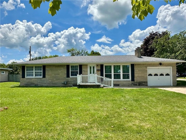 1321 Rudy Ave, Mattoon, IL 61938 - ranch-style home with stone siding, a garage, a chimney, a front lawn, and concrete driveway