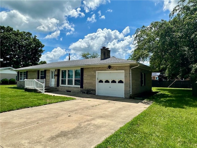 1321 Rudy Ave, Mattoon, IL 61938 - ranch-style home with a garage, stone siding, a chimney, concrete driveway, and a front yard