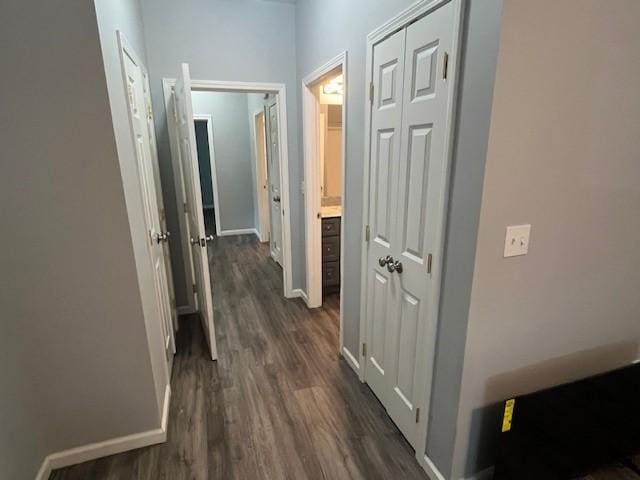 602 S Linden St, Effingham, IL 62401 - hallway with dark wood-type flooring and baseboards