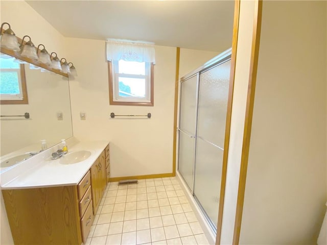 828 S Indiana St, Ashmore, IL 61912 - full bath with vanity, a shower stall, and tile patterned floors