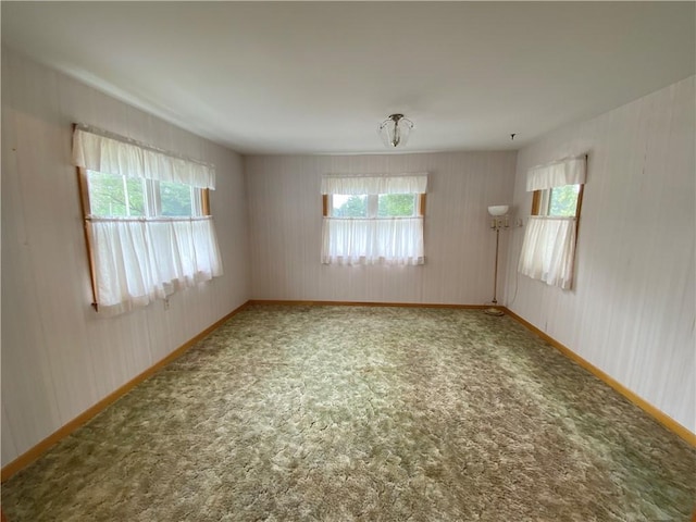 828 S Indiana St, Ashmore, IL 61912 - spare room featuring baseboards