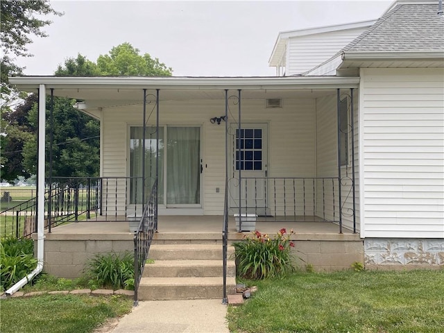 828 S Indiana St, Ashmore, IL 61912 - view of exterior entry featuring covered porch