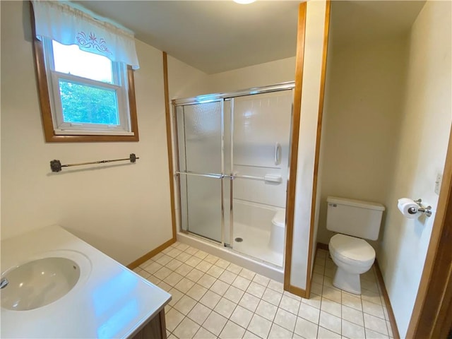828 S Indiana St, Ashmore, IL 61912 - bathroom with tile patterned flooring, a stall shower, and vanity
