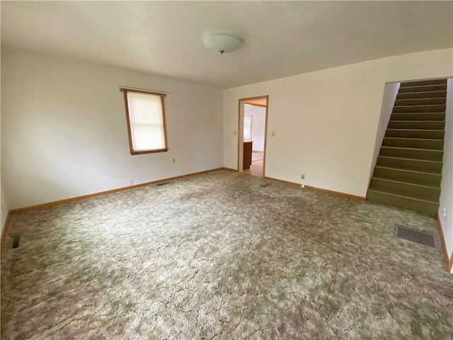 828 S Indiana St, Ashmore, IL 61912 - unfurnished room featuring carpet and stairs