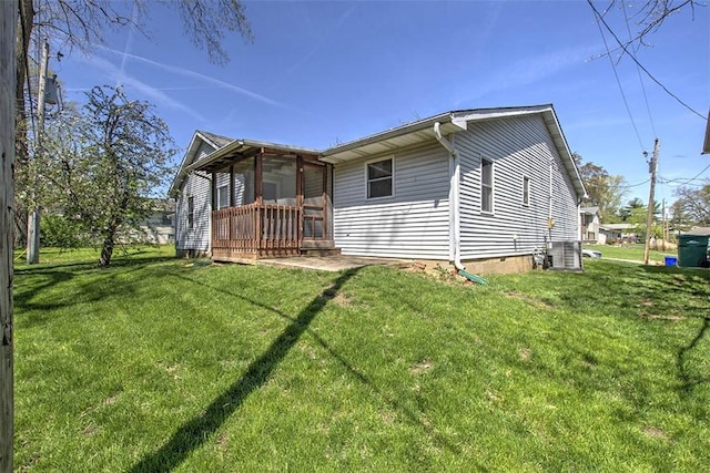 2839 E Wood St, Decatur, IL 62521 - view of side of home with a sunroom and a yard