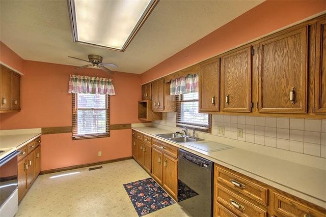 2839 E Wood St, Decatur, IL 62521 - kitchen featuring black dishwasher, electric stove, brown cabinets, and a sink
