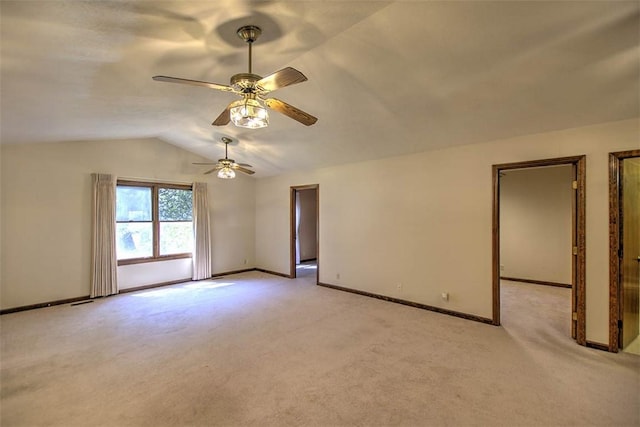 2839 E Wood St, Decatur, IL 62521 - empty room featuring lofted ceiling, light carpet, baseboards, and ceiling fan