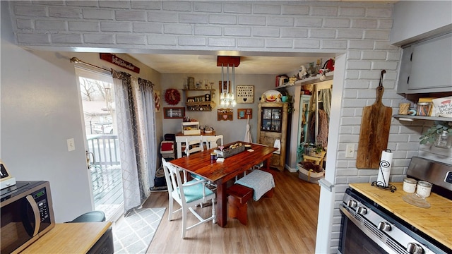 dining space featuring light hardwood / wood-style floors