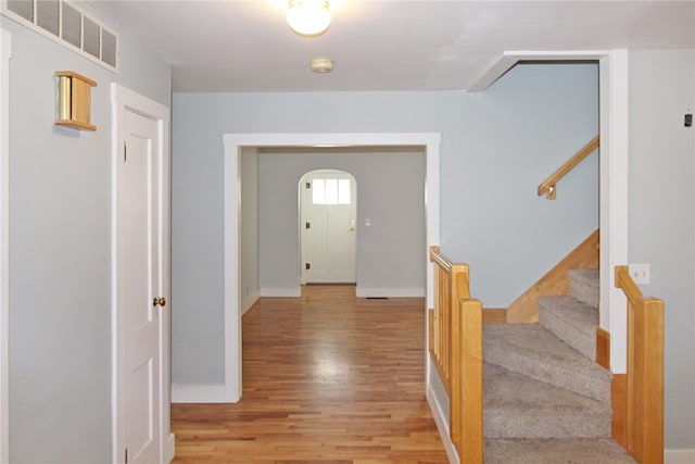 foyer with light hardwood / wood-style floors