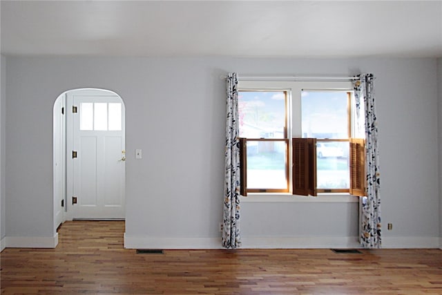 entrance foyer with light hardwood / wood-style floors