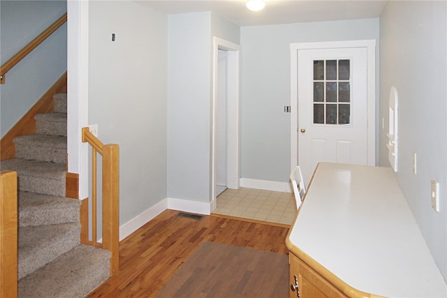 foyer featuring hardwood / wood-style floors