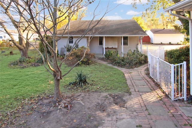 view of front of property with a front lawn