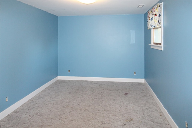 unfurnished room with carpet floors