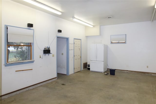 garage featuring white refrigerator