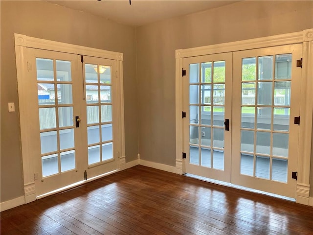doorway to outside featuring french doors and hardwood / wood-style flooring