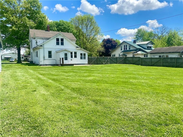view of yard with fence