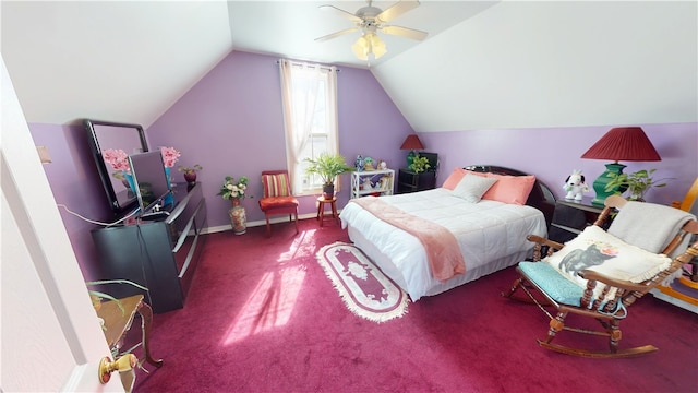 bedroom with vaulted ceiling, carpet, a ceiling fan, and baseboards