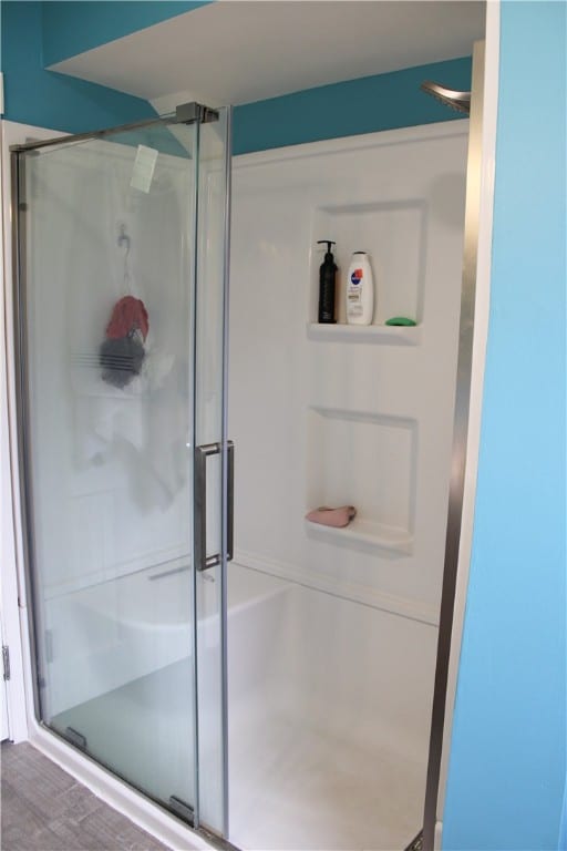 bathroom with an enclosed shower