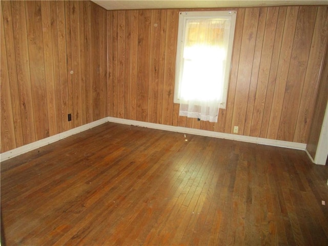 1729 N 20th St, Springfield, IL 62702 - empty room with hardwood / wood-style flooring and wood walls