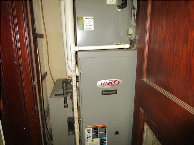 1729 N 20th St, Springfield, IL 62702 - utility room featuring heating unit