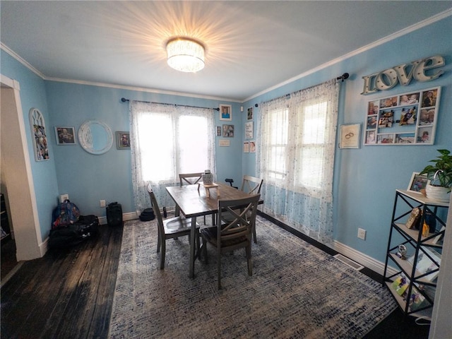 114 E 11th St, Georgetown, IL 61846 - dining room with wood finished floors, plenty of natural light, and crown molding