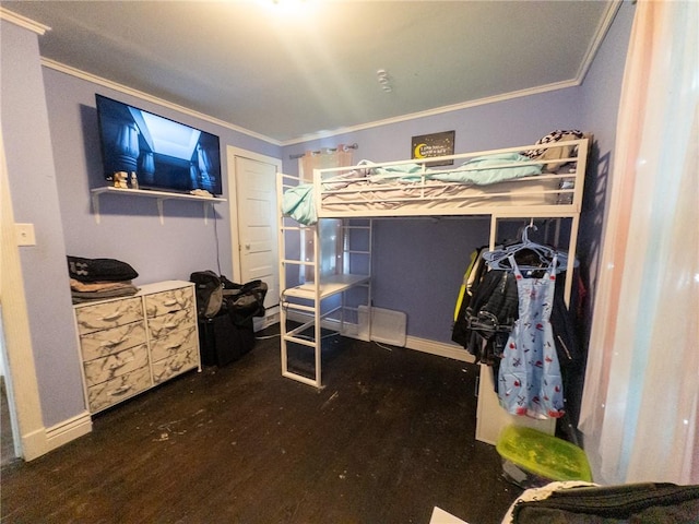 114 E 11th St, Georgetown, IL 61846 - bedroom featuring ornamental molding and wood finished floors