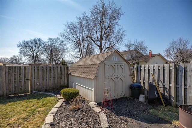 view of shed with a fenced backyard