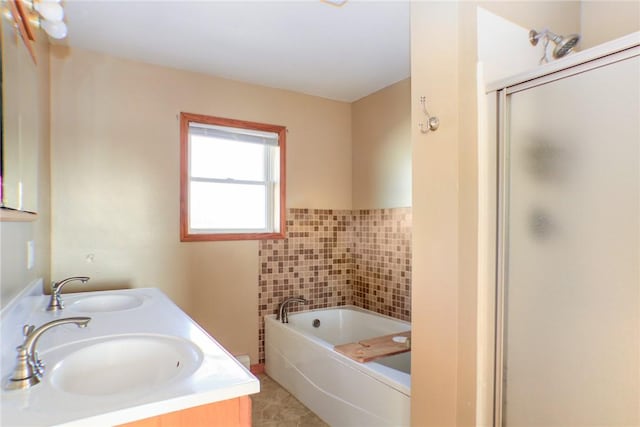 bathroom with plus walk in shower and vanity