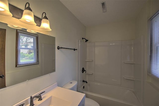 113 White Pines Cir, Decatur, IL 62521 - bathroom featuring toilet, vanity, and bathing tub / shower combination