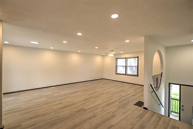 113 White Pines Cir, Decatur, IL 62521 - unfurnished living room with recessed lighting, light wood-style floors, a ceiling fan, and baseboards