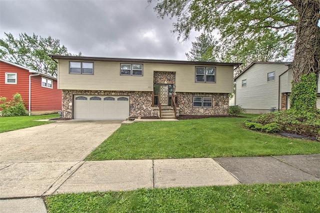 113 White Pines Cir, Decatur, IL 62521 - bi-level home with stone siding, driveway, an attached garage, and a front yard