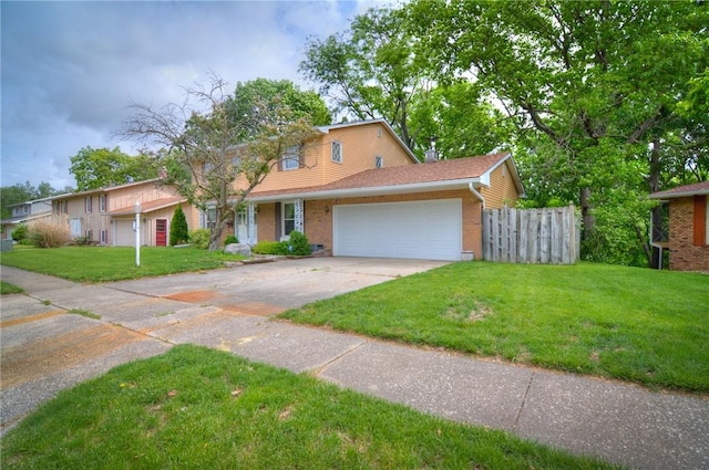 2290 N Kenwood Ct, Decatur, IL 62526 - traditional-style house with a garage, brick siding, and concrete driveway