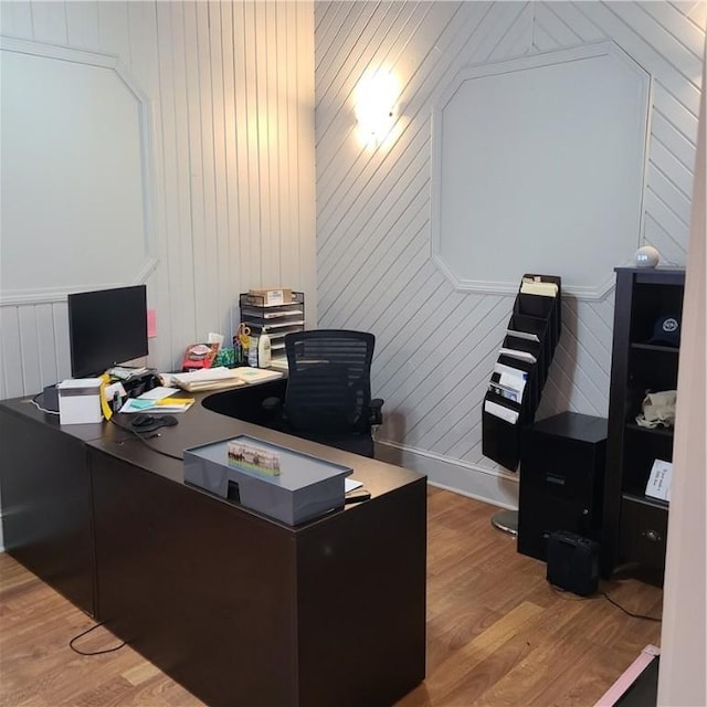 office space featuring wood finished floors