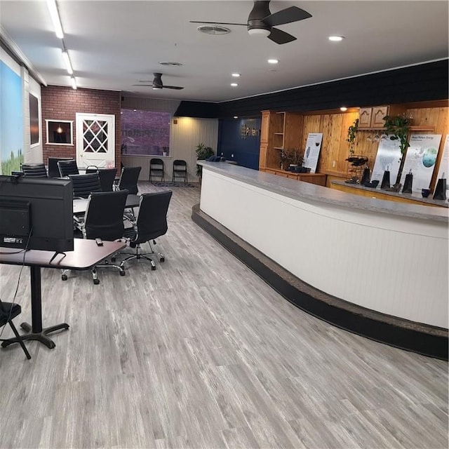 home office featuring recessed lighting, light wood-style floors, and a ceiling fan