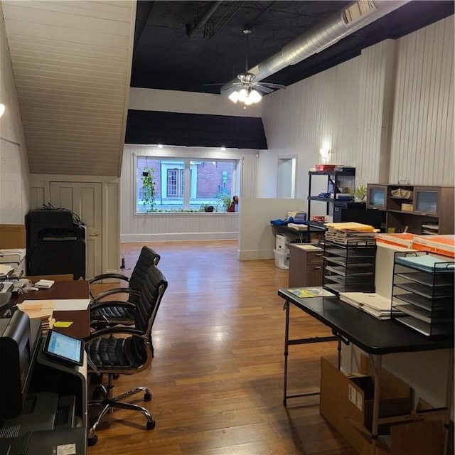 office area featuring a ceiling fan, wood finished floors, and visible vents