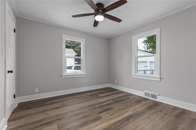 204 W Eiche Ave, Effingham, IL 62401 - unfurnished room featuring crown molding, dark wood finished floors, and ceiling fan