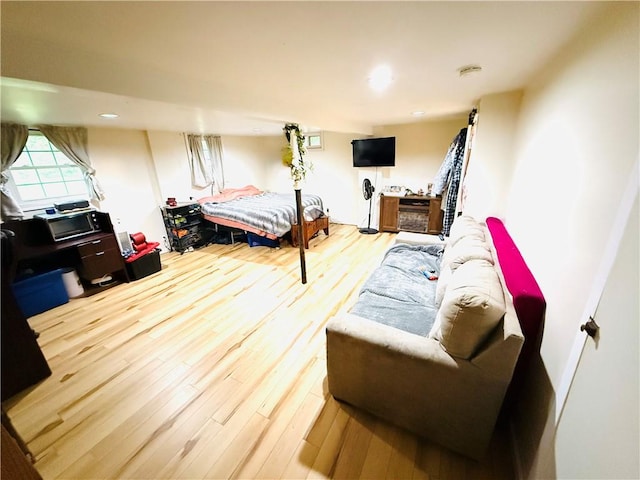 211 E 5th Ave, Rankin, IL 60960 - bedroom featuring wood finished floors