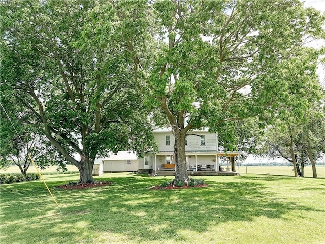 16781 E 1600th Ave, Palestine, IL 62451 - view of green lawn with a porch