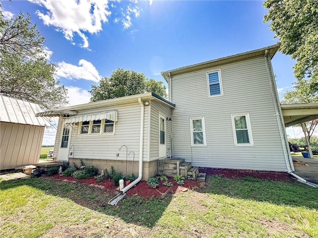 16781 E 1600th Ave, Palestine, IL 62451 - rear view of property with a lawn