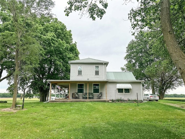 16781 E 1600th Ave, Palestine, IL 62451 - back of property featuring a lawn and metal roof