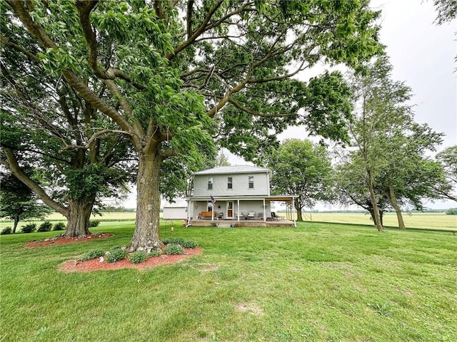 16781 E 1600th Ave, Palestine, IL 62451 - view of green lawn featuring a porch