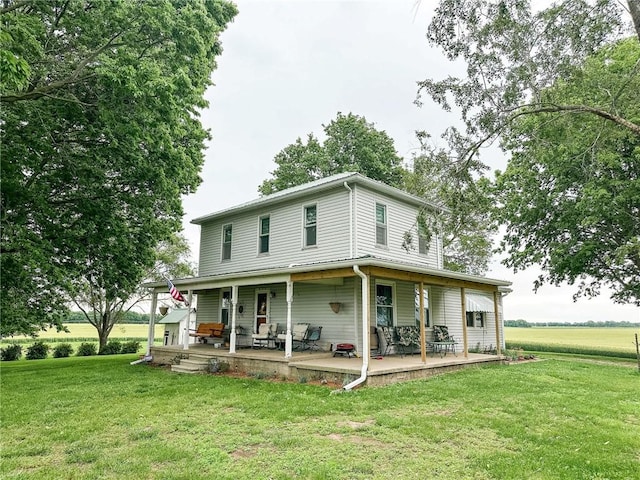 16781 E 1600th Ave, Palestine, IL 62451 - back of property featuring covered porch and a lawn
